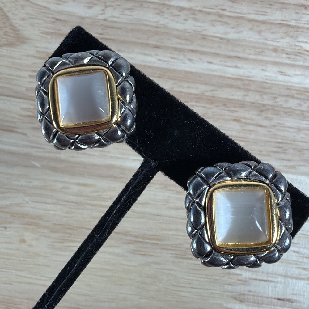VINTAGE MARKED CROWN PD PREMIER DESIGNS CLIP ON EARRINGS WITH CENTER MILKY GLASS